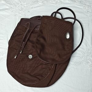 Tumi Italian Leather Drawstring Backpack Sling